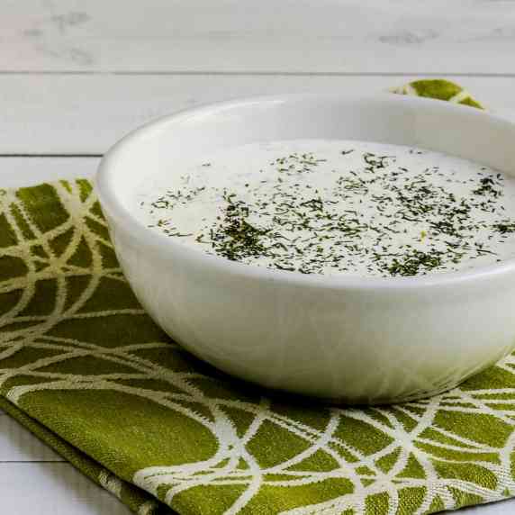 Market Street Grill Cucumber Dill Sauce shown in serving bowl in green-white napkin.