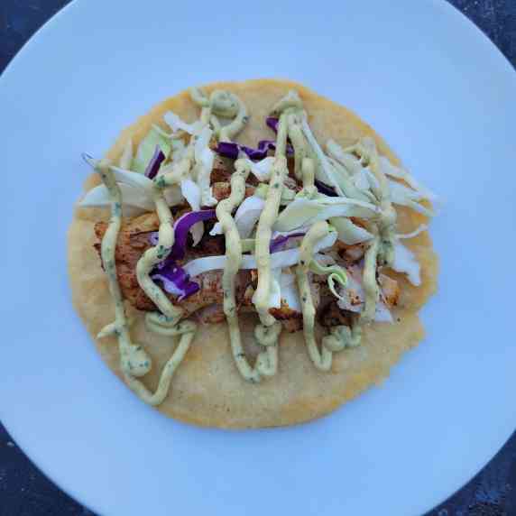 Grilled Fish Tacos with coleslaw and Avocado Lime Crema