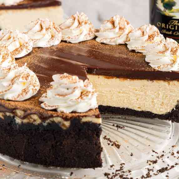 Smooth and creamy cheesecake infused with Irish cream sits atop a crumbly Oreo cookie crust in this 