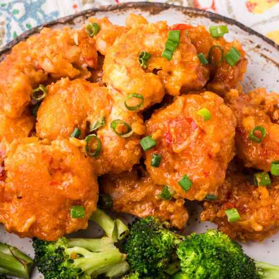 Bang bang shrimp brings the heat AND the flavor. All you have to do is dunk, fry, then toss in spicy