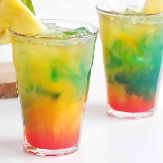 With tropical pineapple and mango flavors complemented by dark rum, blue curacao, and grenadine, thi