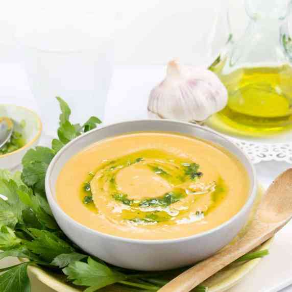 Squash and cream cheese soup with a parsley oil