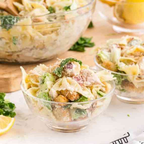 Caesar Pasta Salad served in two glass bowls