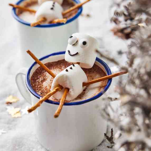 Hot chocolate with marshmallow puppets