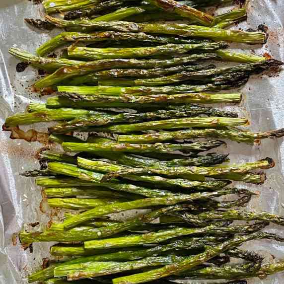 Oven roasted asparagus still on aluminum foil