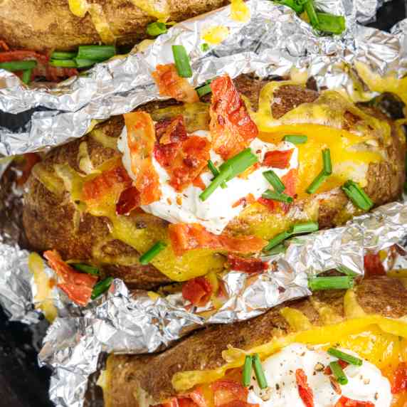 foil wrapped fully loaded baked potatoes.