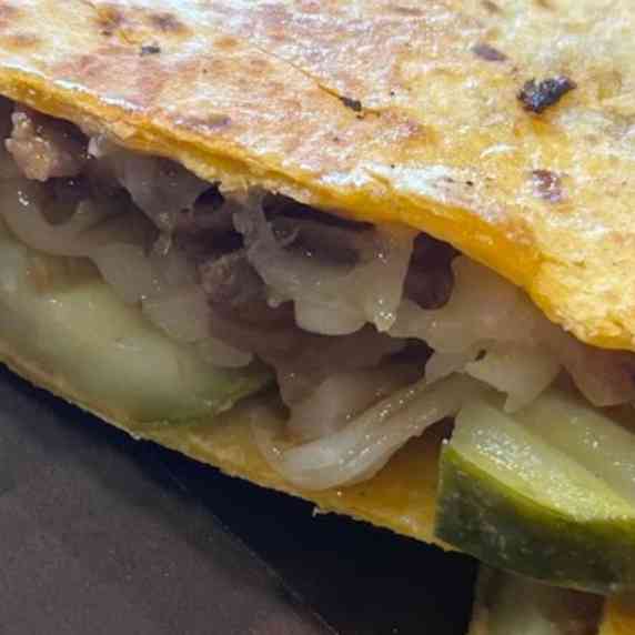 A slice of cuban sandwich quesadilla!