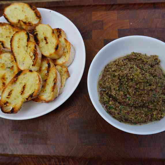 This green olive tapenade is a great appetizer for a group- or you can eat it by yourself- don't wor
