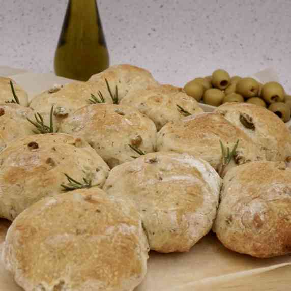 Freshly baked tear and share rosemary and olive bread