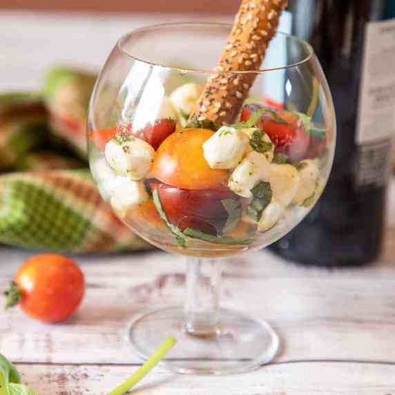 Cherry Tomato Caprese Salad in brandy glass