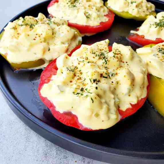 Plate of egg salad tomatoes.