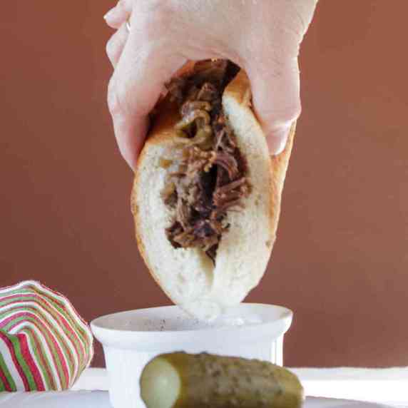 dipping a french dip sandwich