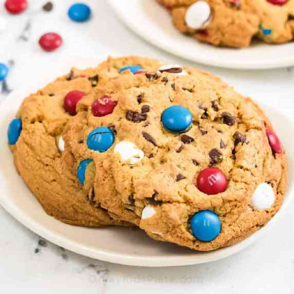 Cookies on a plate with red white and blue M&Ms.