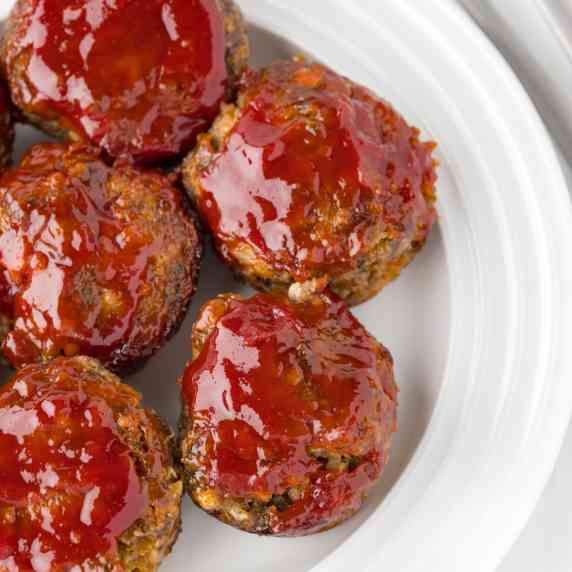 Plate of miniature meatloaves.