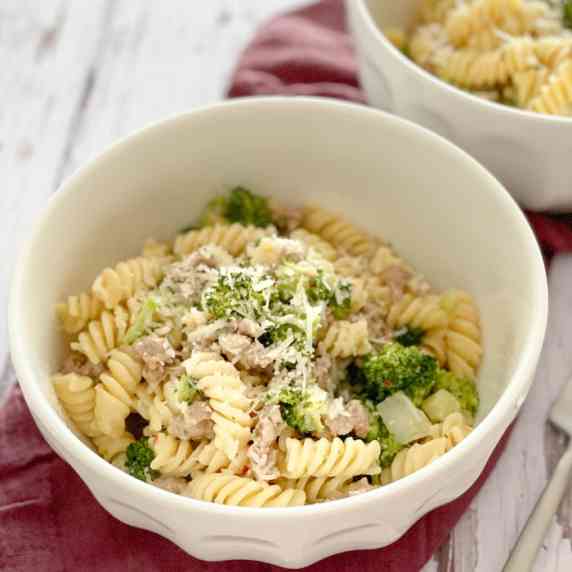 Pasta with broccoli and sausage in a bowl