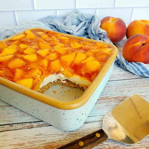 A blue pan of peach delight showing it's layers.