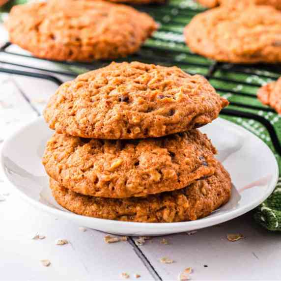Stacked pumpkin oatmeal cookies on a plate