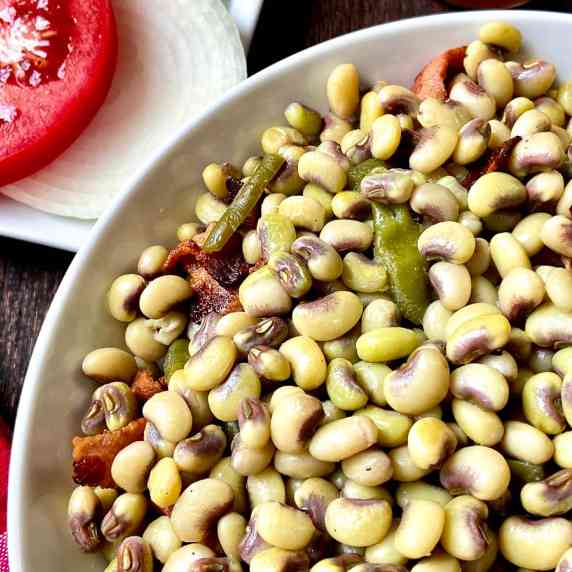 Purple Hull Peas in a white bowl.