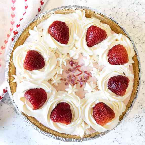 Filled with whipped cream and pureed strawberries, Strawberry Whipped Cream Pie is fresh and light a