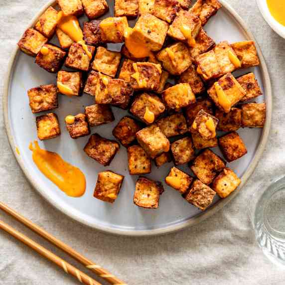 air fryer tofu served on a round plate 
