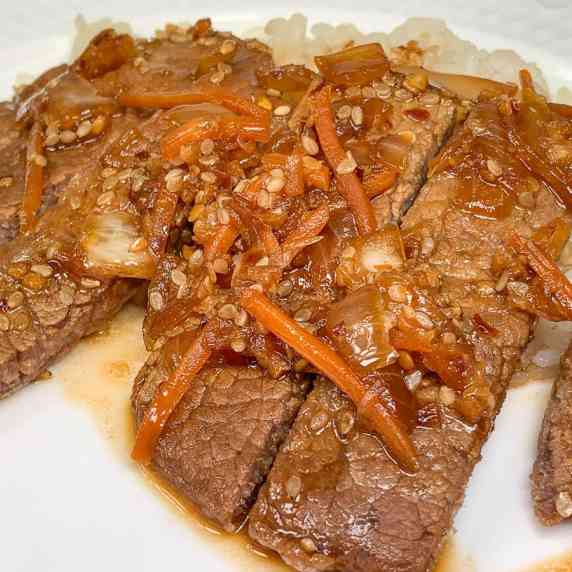 meat and rice on a plate