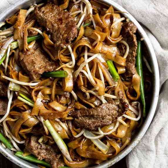 Chinese beef chow fun served in a metal bowl