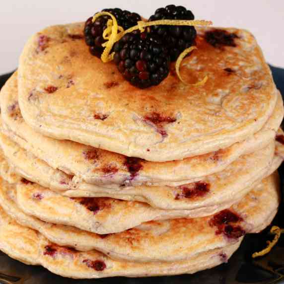 A plate of blackberry pancakes.