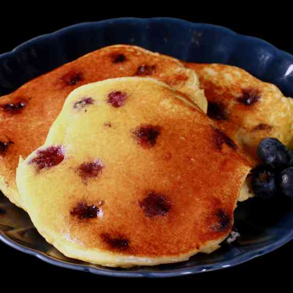 A plate of keto blueberry protein pancakes.