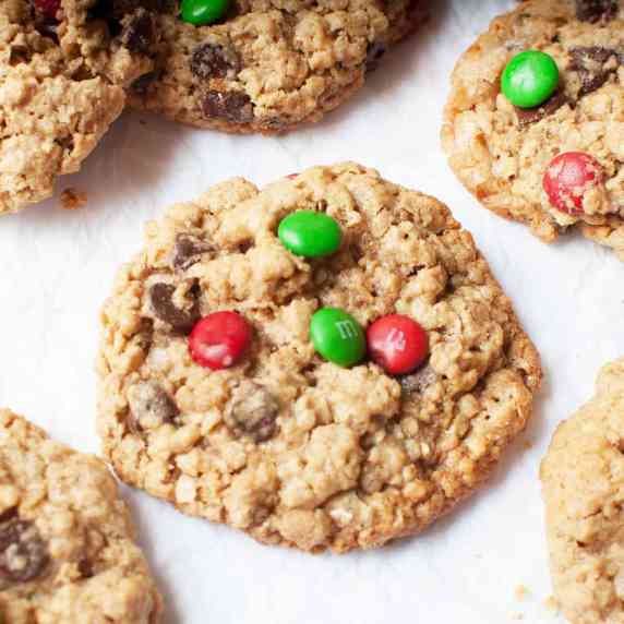 A photo of a monster cookie with red and green M&Ms.
