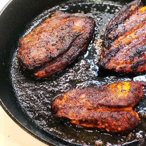 blackened chicken in cast iron pan