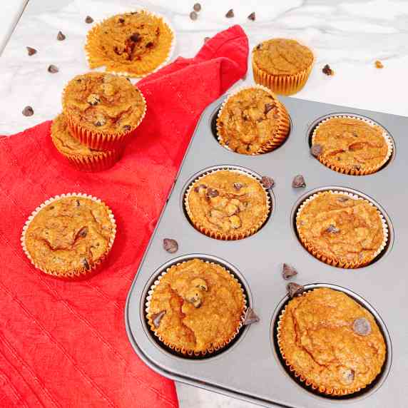pumpkin muffins with almond flour in a muffin tin