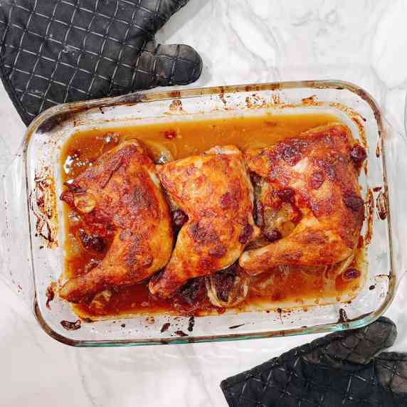 kosher cranberry chicken with onion soup mix in a baking dish