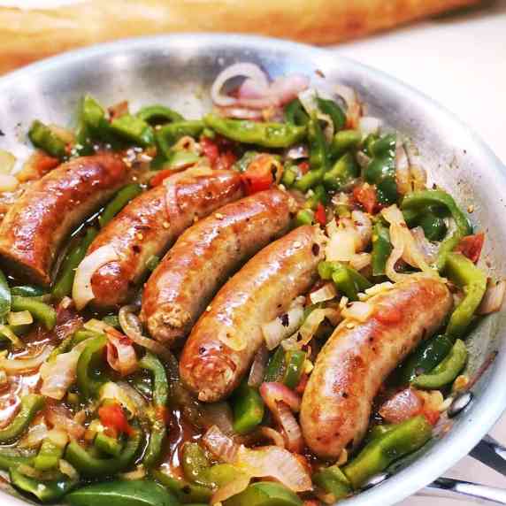 sausage and peppers in skillet