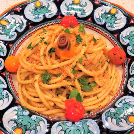 Spaghetti with anchovy fillets and plum tomatoes