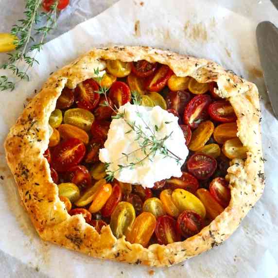 cherry tomato galette all baked up with fresh ricotta on top