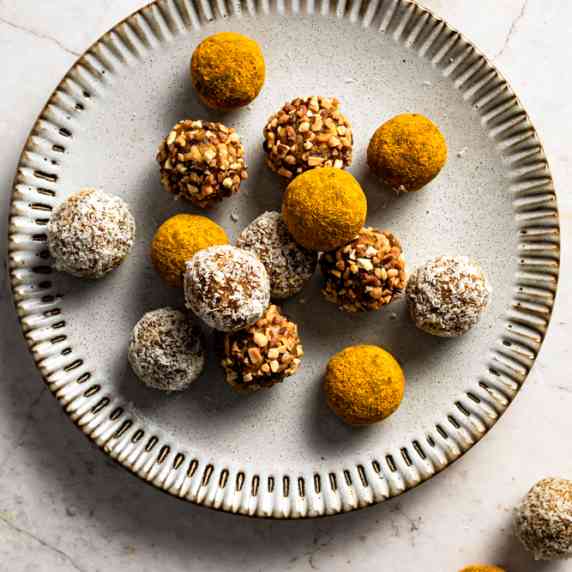 Turmeric balls arranged in an aesthetic plate