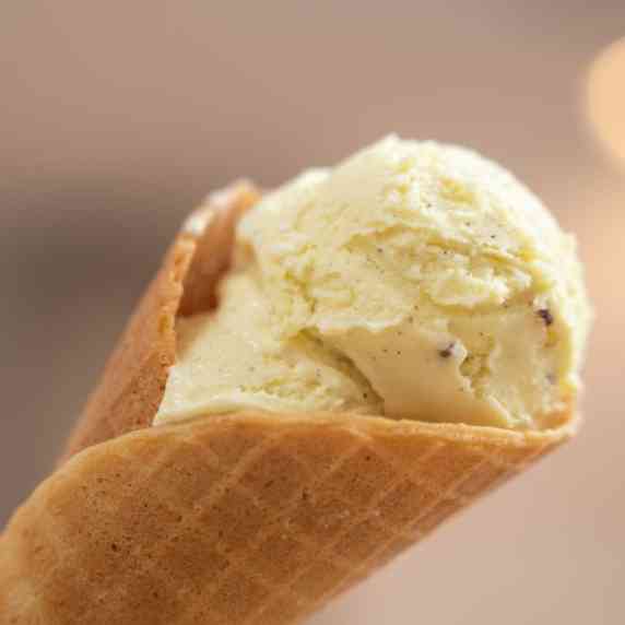 Vanilla ice cream in a waffle cone.