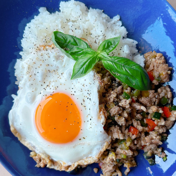 Rice topped with stir-fried basil and minced pork and a fried egg