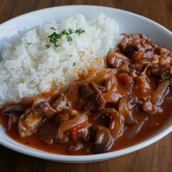 Hayashi rice is a dish of beef, onion, mushroom, and tomato stew served on rice.