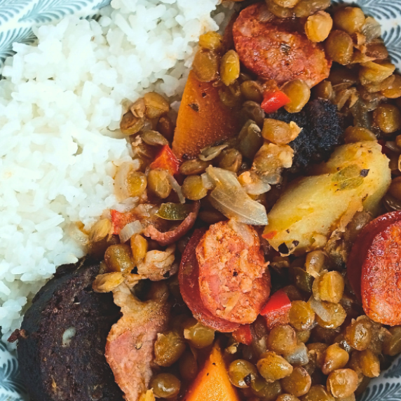 cuban lentil soup served with white rice