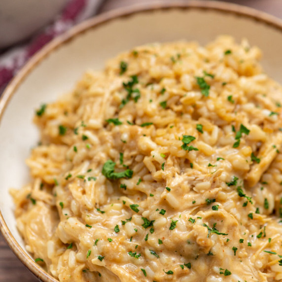 creamy chicken and rice casserole in a serving bowl.