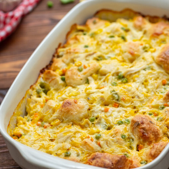 chicken pot pie casserole in a white baking dish.