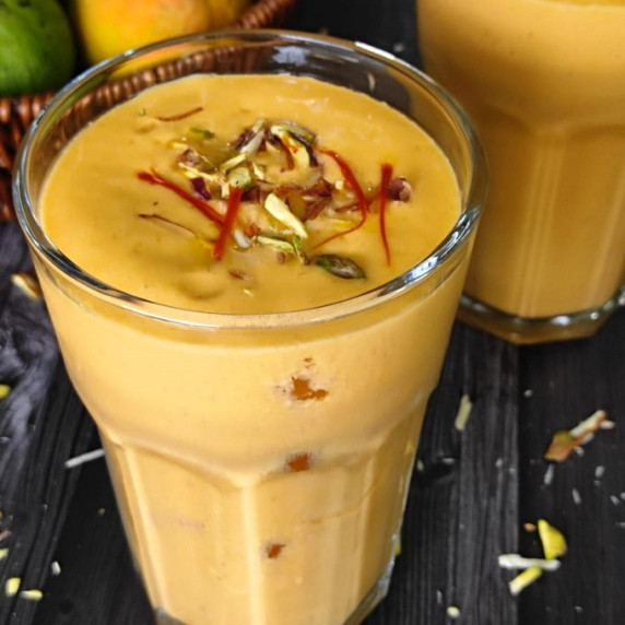 A refreshing summer drink made with mangoes & yogurt. Gluten-free & quick to make. Serve chilled!