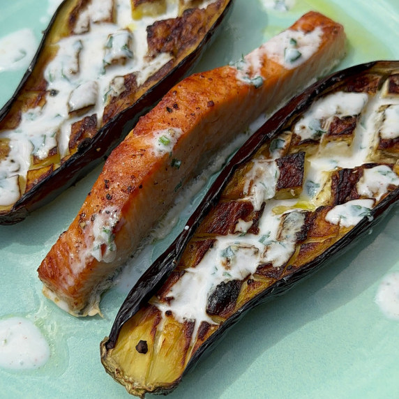 Baked Aubergine with Yogurt Dressing Served alongside grilled salmon