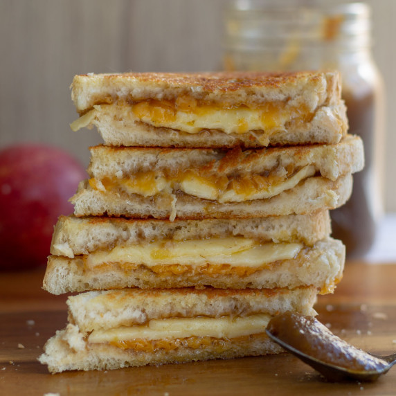 stack of apple butter and sharp cheddar grilled cheese halves