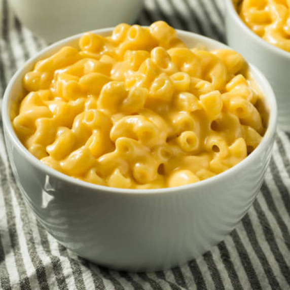 Homemade macaroni and cheese in bowls.