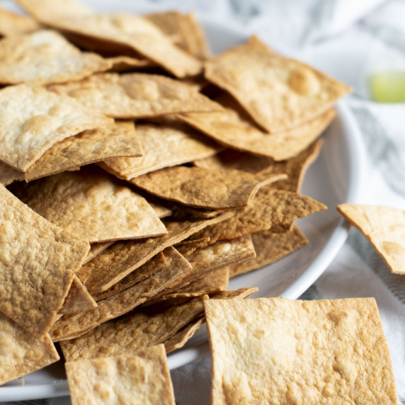 A plate full of high protein tortilla chips.