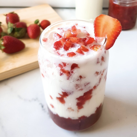 Korean Strawberry Milk Recipe in a tall glass.