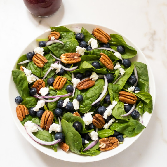 Bowl of blueberry spinach salad