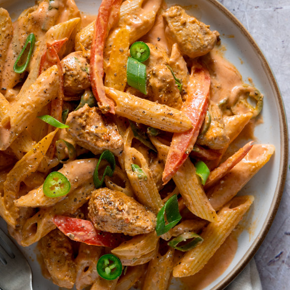 Diced chicken, bell peppers and penne pasta in a spicy, creamy sauce.